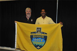 Councilman Stewart Cumbo and Mayor Bruce Wahl at MML Convention receiving second “Banner City Award” presented to the Town of Chesapeake Beach 