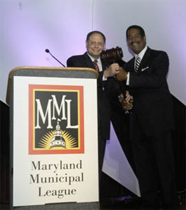 Councilman Stewart Cumbo passing the Gavel to the new incoming MML President 